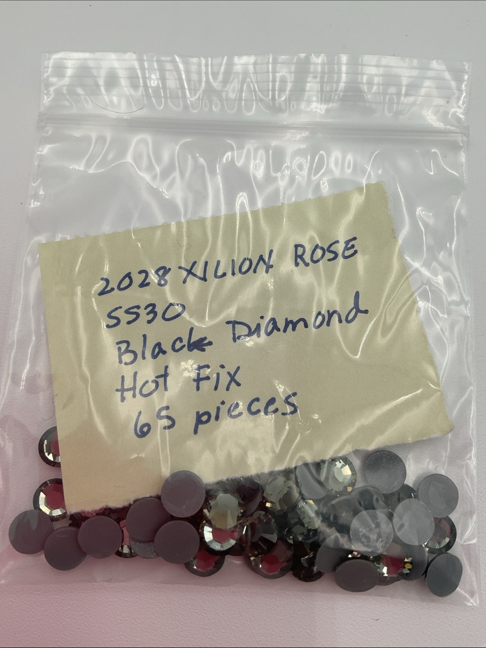 Swarovski • Color: Black Diamond, 2028 XILION Rose Hotfix Rhinestones